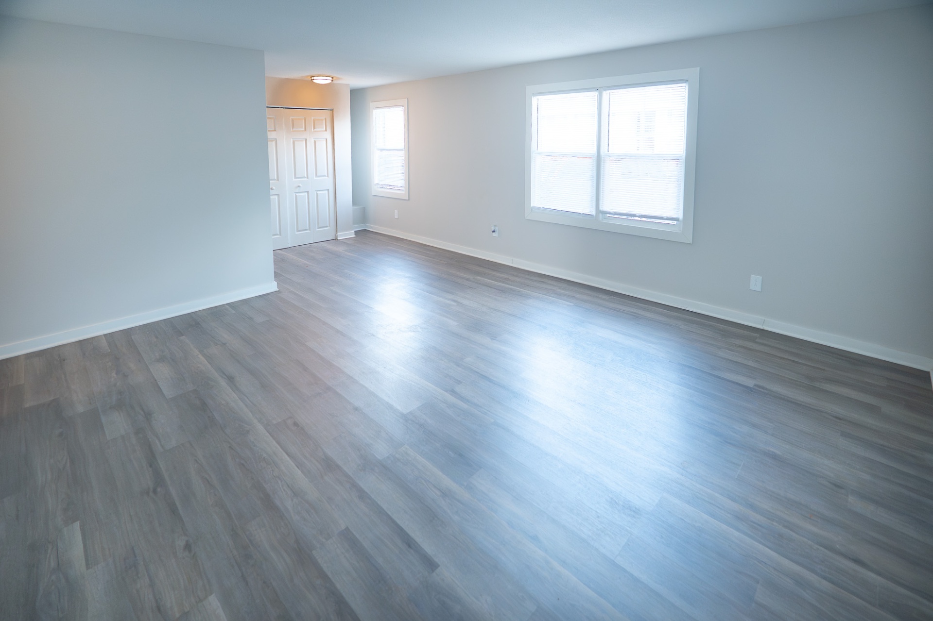 Open Living Room with wood-style flooring
