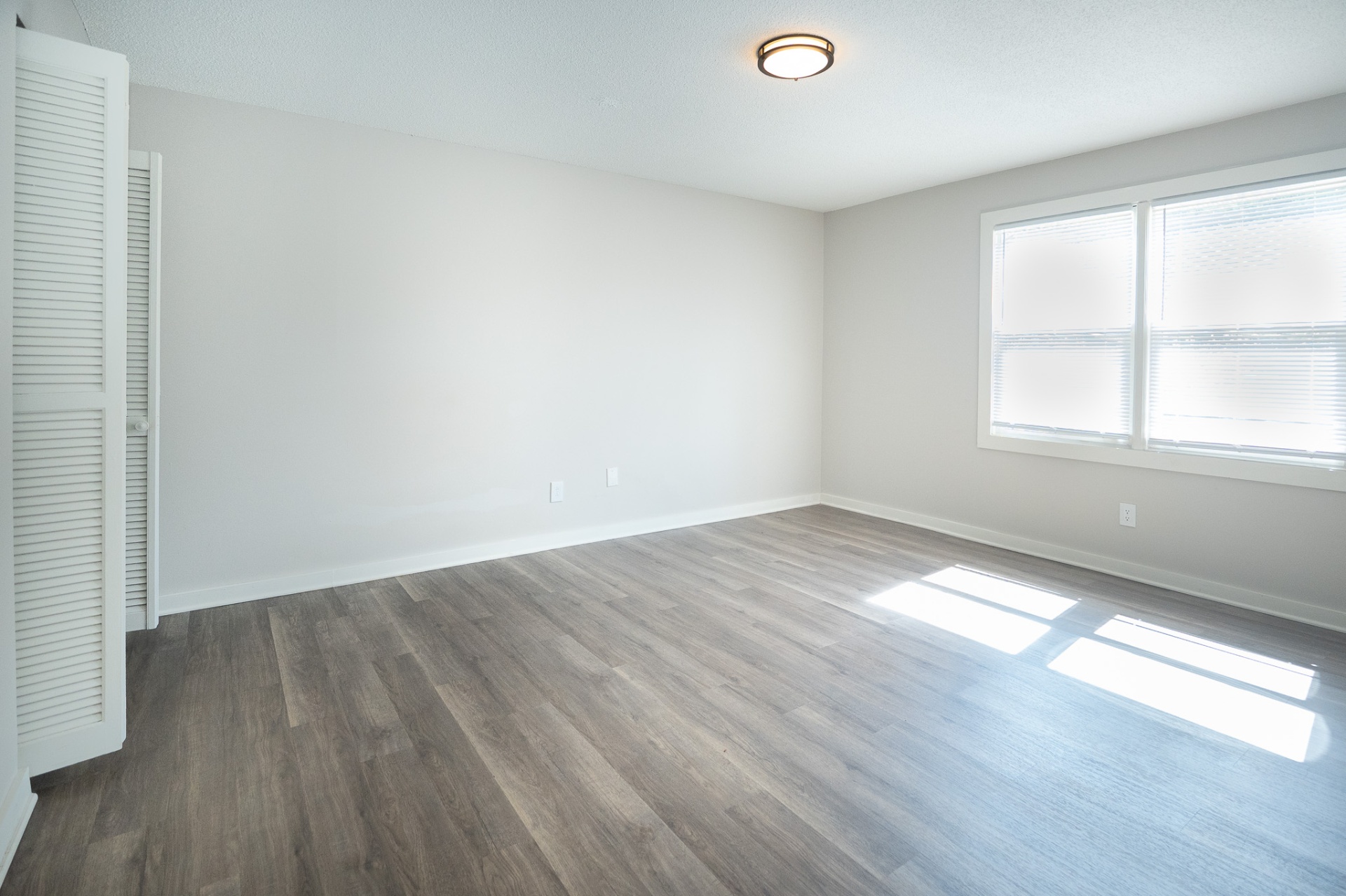 Spacious Bedroom with large windows